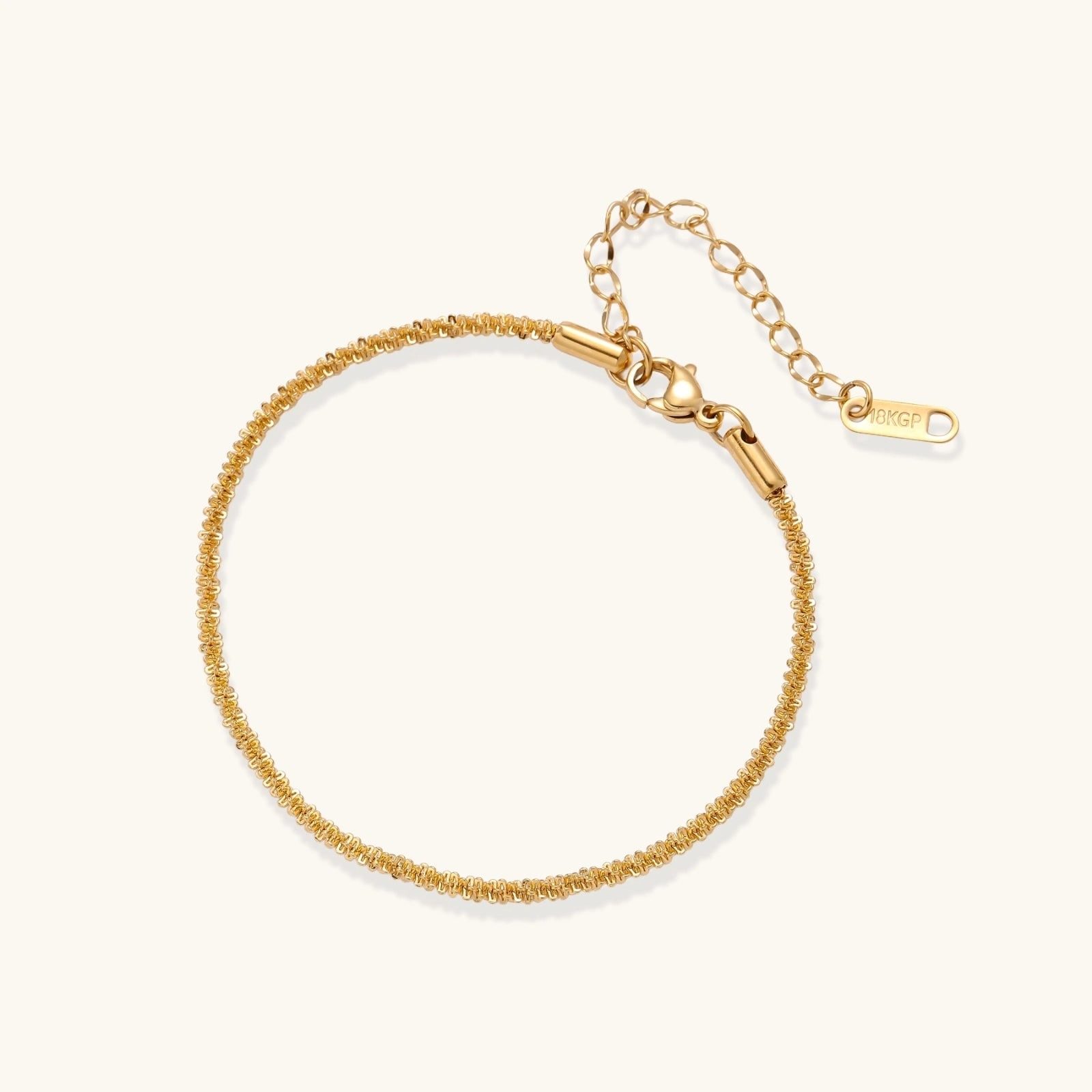 Bracelet Chaîne Golden Hour, acier inoxydable plaqué or 18k, photographie du bijou sur fond clair